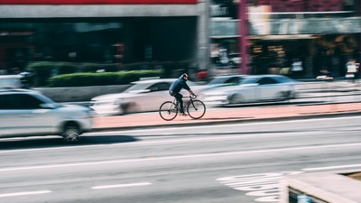 A picture of man on bicycle
